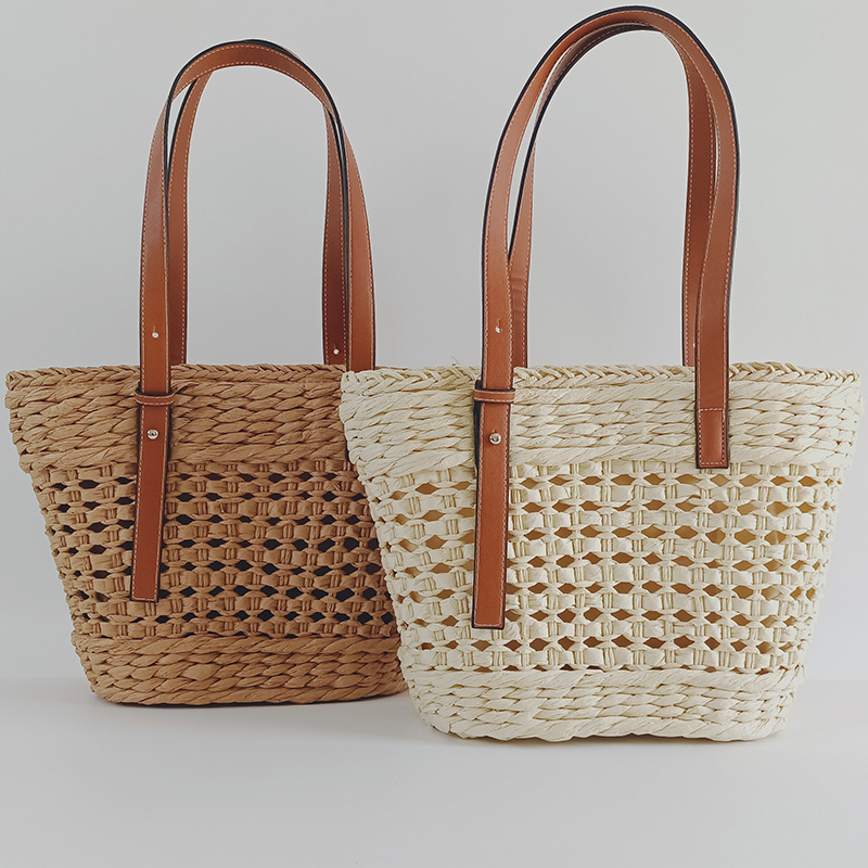 Straw woven bag women's 2026 new hollow handmade woven bag style single shoulder handbag seaside vacation beach bag