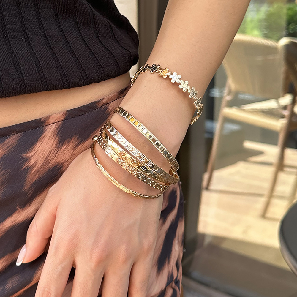 Sweet cool carved pattern flower bracelet metal textured layered bangle
