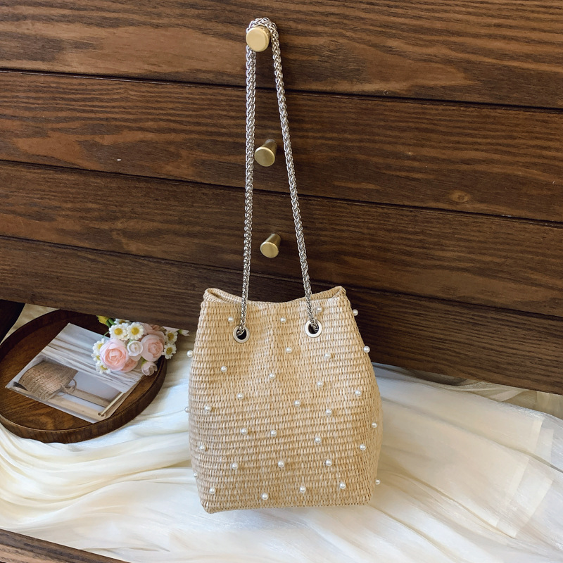 Straw bag women 2025 summer new pearl rhinestone chain bucket bag vacation style woven bag
