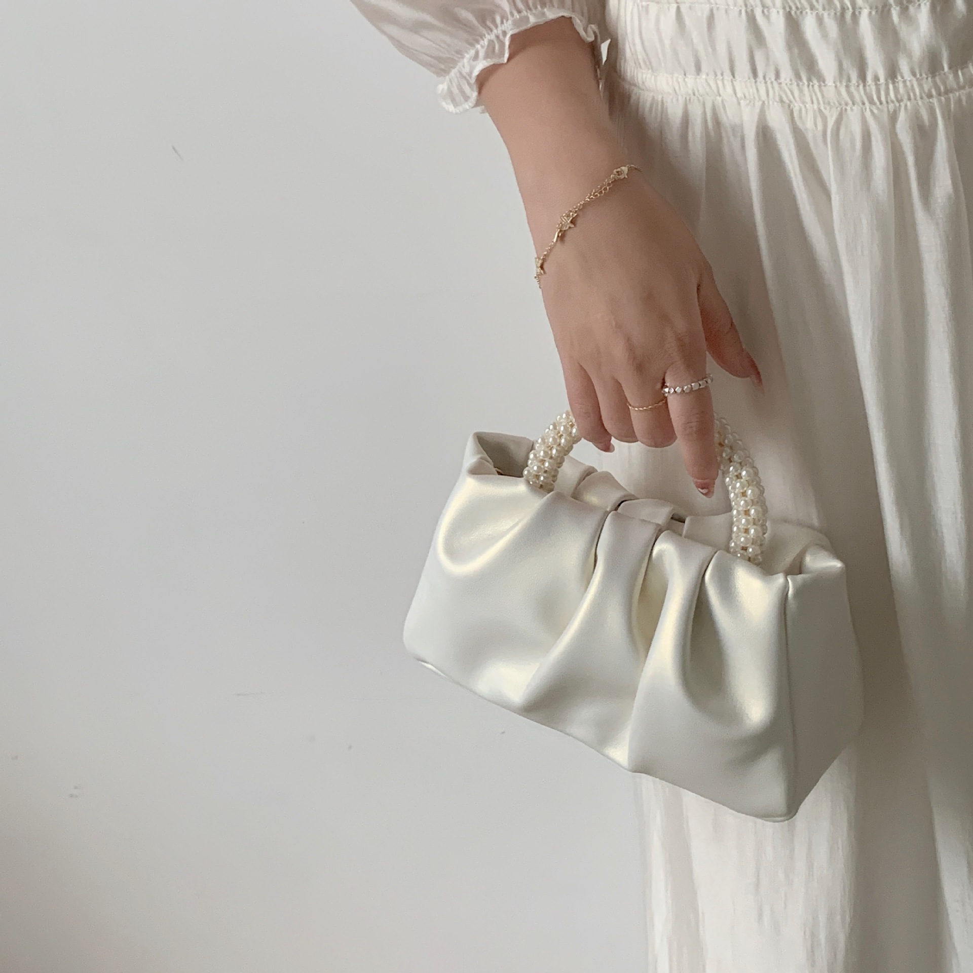 2026 new women's bag pearl wrist pleated cloud handbag shoulder crossbody mini bag