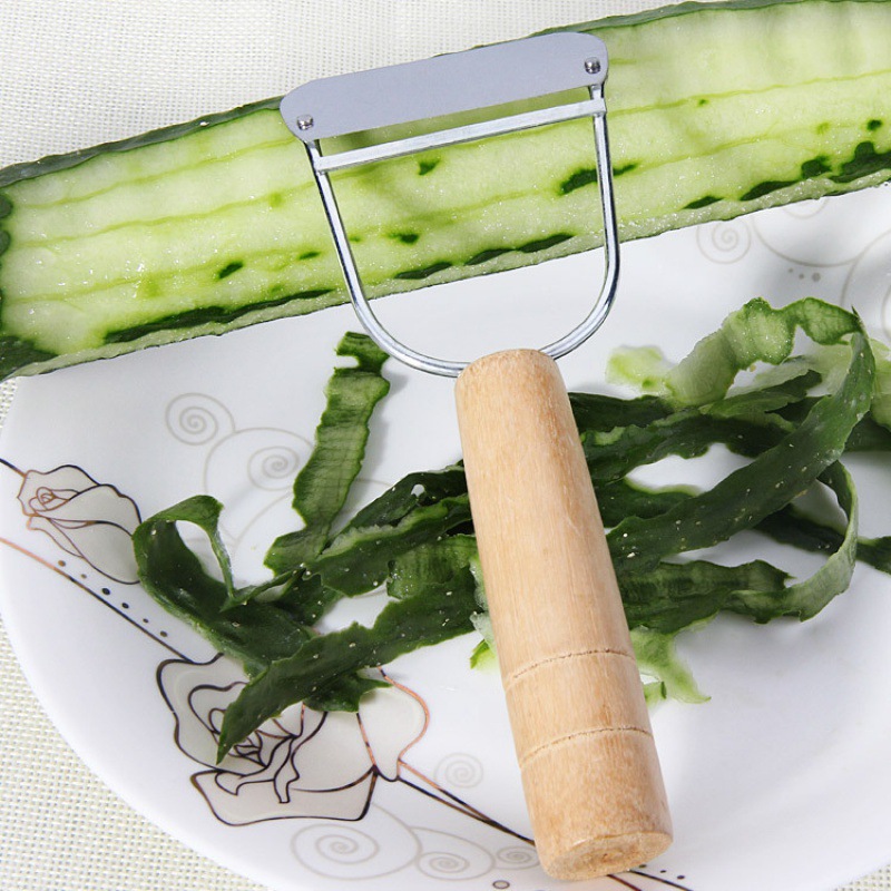 Two-dollar store wooden handle planer peeler stainless steel fruit and vegetable peeler vegetable and fruit peeling knife