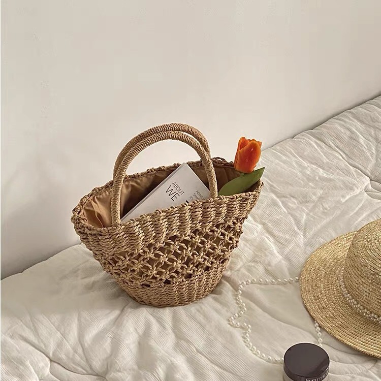 New solid color hollow handbag straw bag women's bag large capacity bohemian oval woven crossbody bag