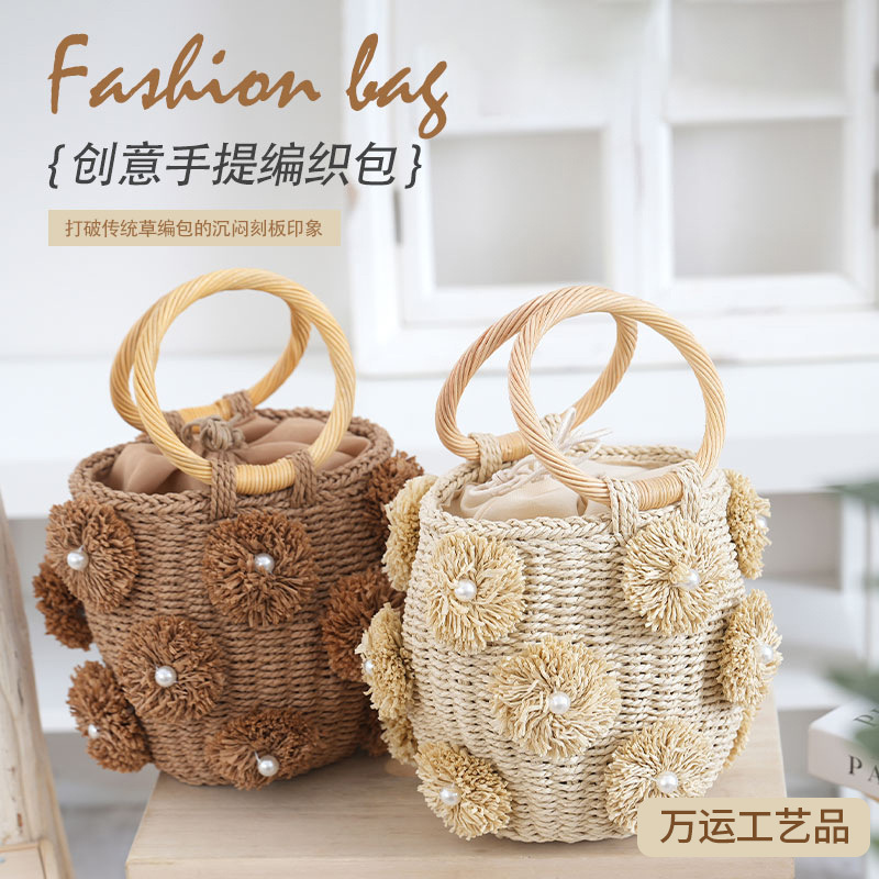 Summer fresh women's handbag, handmade woven pearl flower decoration bucket bag, round bracelet straw bag