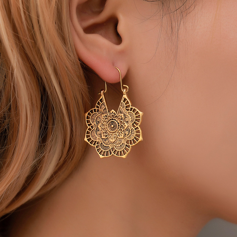 Ethnic Style Earrings Exotic Flavor Metal Hollow Flower Earrings Bohemian Carved Palace Style Ear Drops