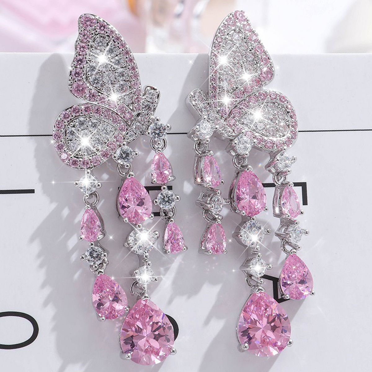 Korean micro-set zircon colored pink butterfly wing tassel drop goddess earring stud banquet annual meeting full diamond earring silver needle