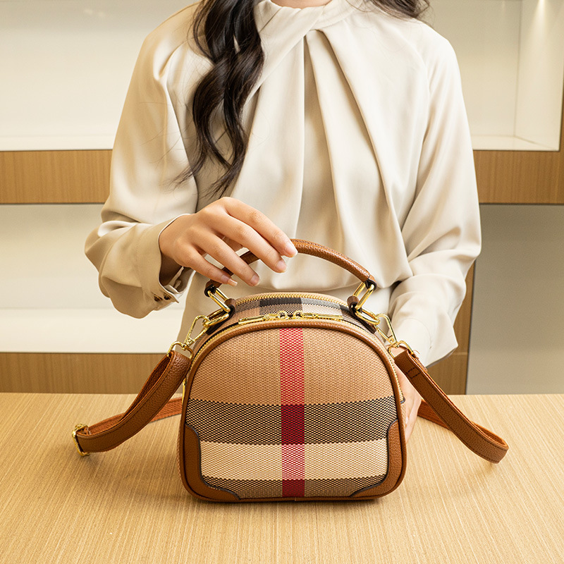 New niche small round bag grid single shoulder crossbody bag small bag