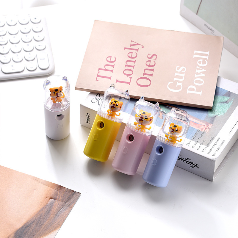 New spray hydrating device portable handheld face humidifier small hydrating spray beauty device alcohol disinfection
